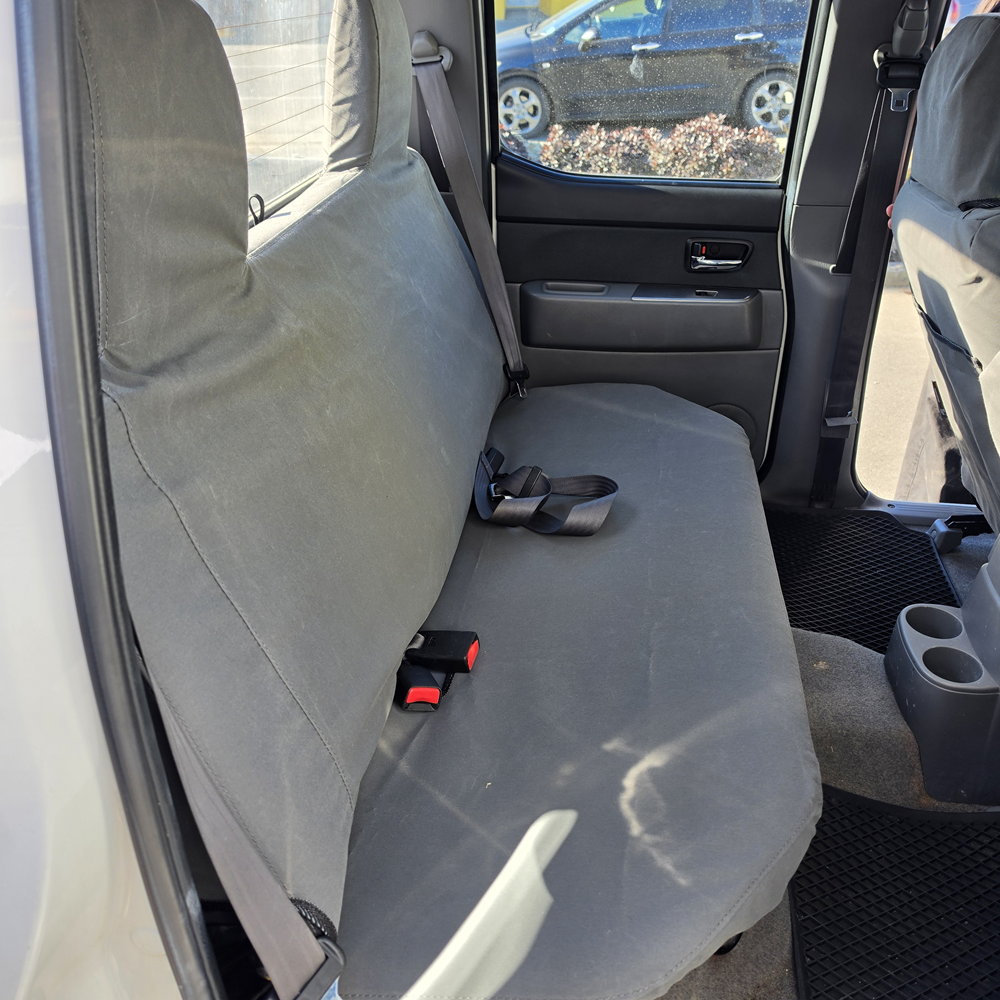 Ford Ranger 2006–2010 rear seat fitted with charcoal canvas seat covers