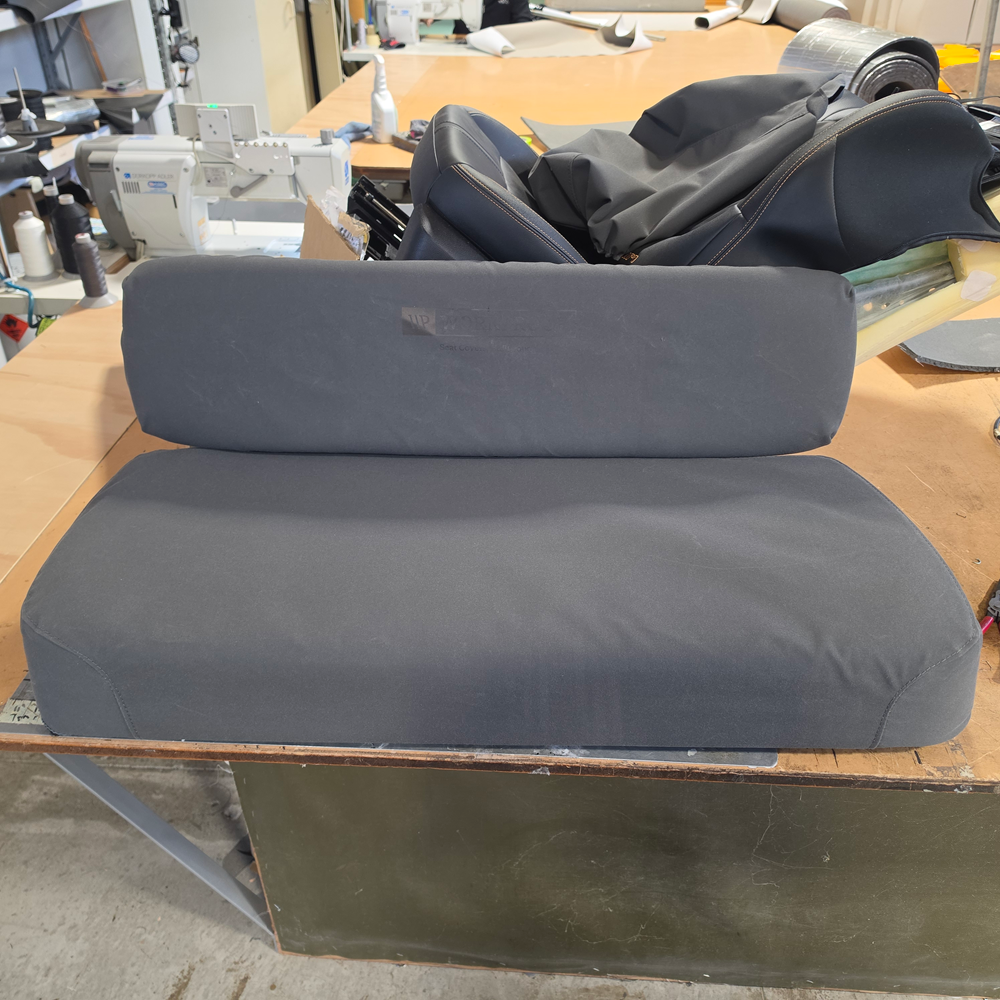 Front view of Kawasaki MULE 600, 610 and SX fitted with Workproof charcoal heavy-duty canvas seat covers.