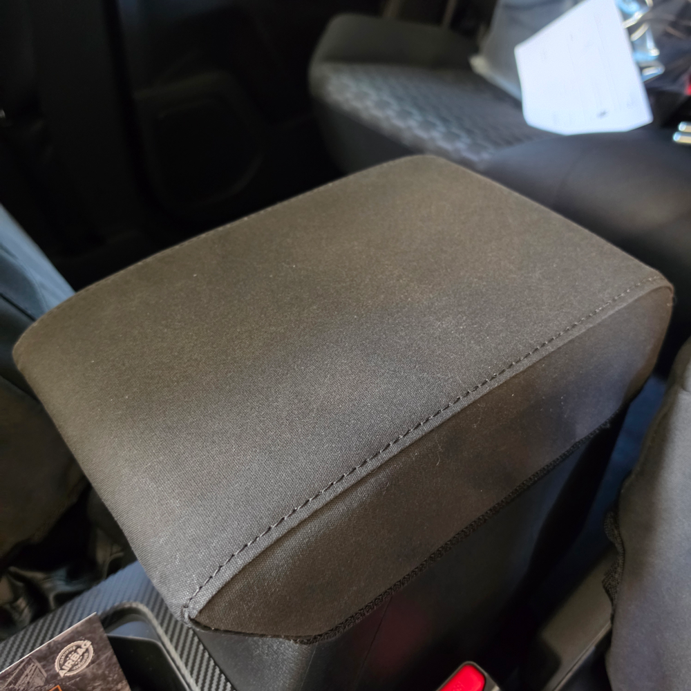 Mitsubishi Triton 2024 center console cover in heavy-duty black canvas, custom-made for a factory-style fit to protect against wear, dirt, and daily use.