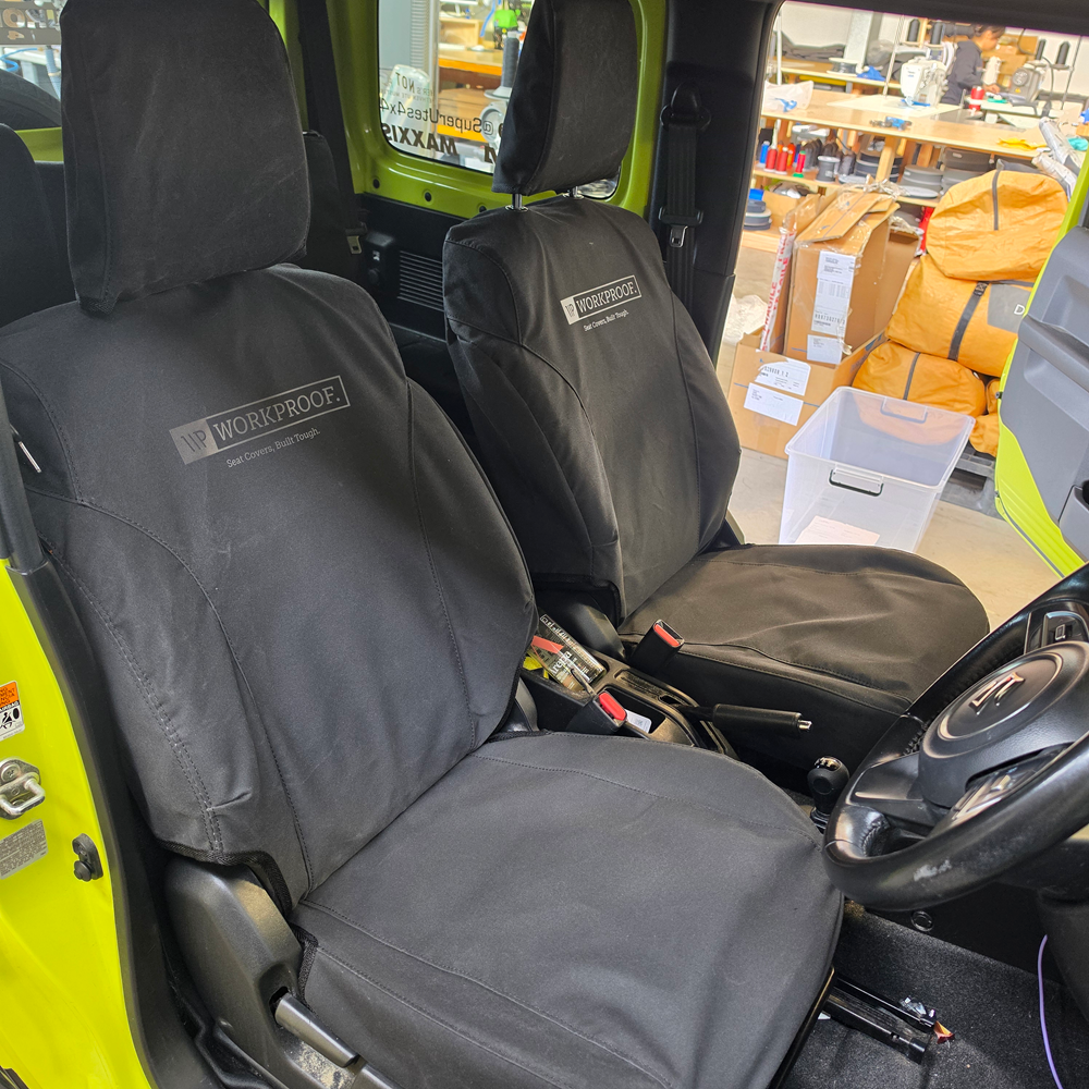 Suzuki Jimny 5 Door front seat covers in black heavy-duty waterproof canvas with factory-style fit for off-road, farming, and everyday use