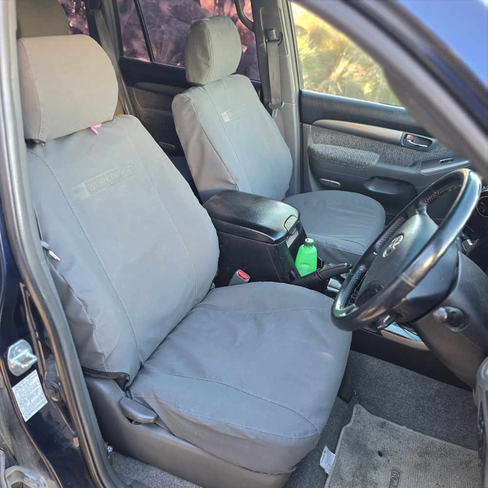 Toyota Land Cruiser Prado 2003–2009 charcoal canvas seat covers, driver seat front view, custom-fit Workproof seat covers made in New Zealand.