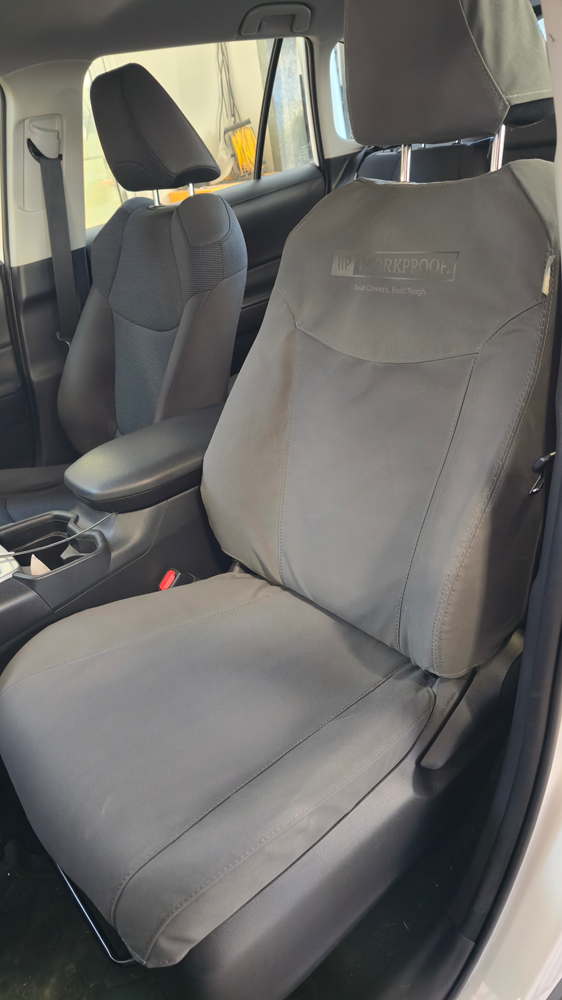 WORKPROOF heavy-duty canvas front seat covers fitted to Toyota RAV4 GX/GXL/Limited Hybrid with waterproof protection, airbag compatibility, and durable factory-style fit.