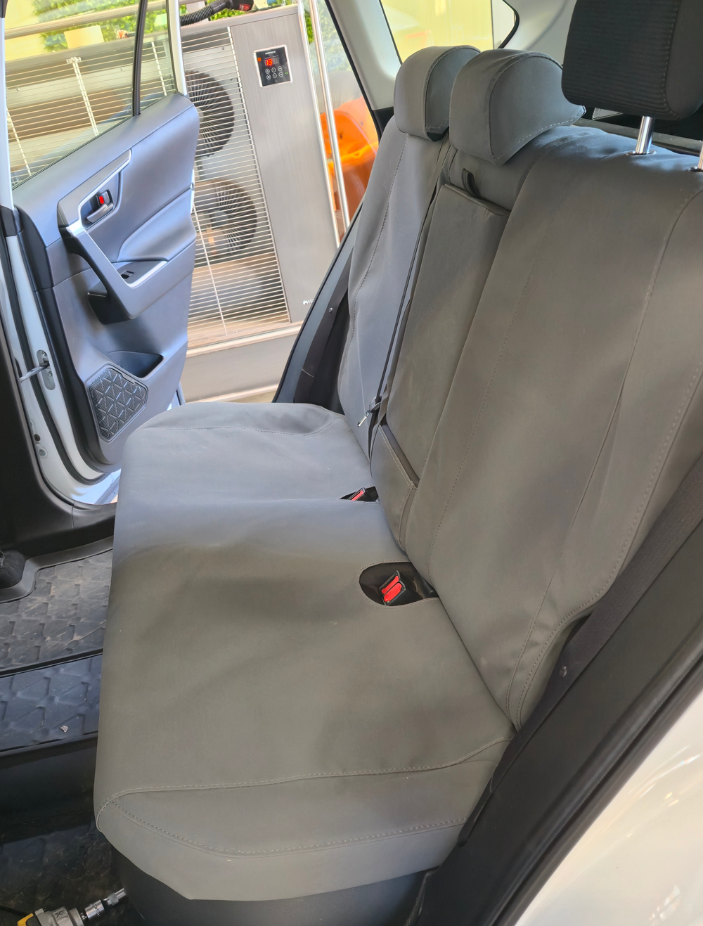 WORKPROOF heavy-duty canvas rear seat covers fitted to Toyota RAV4 GX/GXL/Limited Hybrid with waterproof protection, airbag compatibility, and durable factory-style fit.