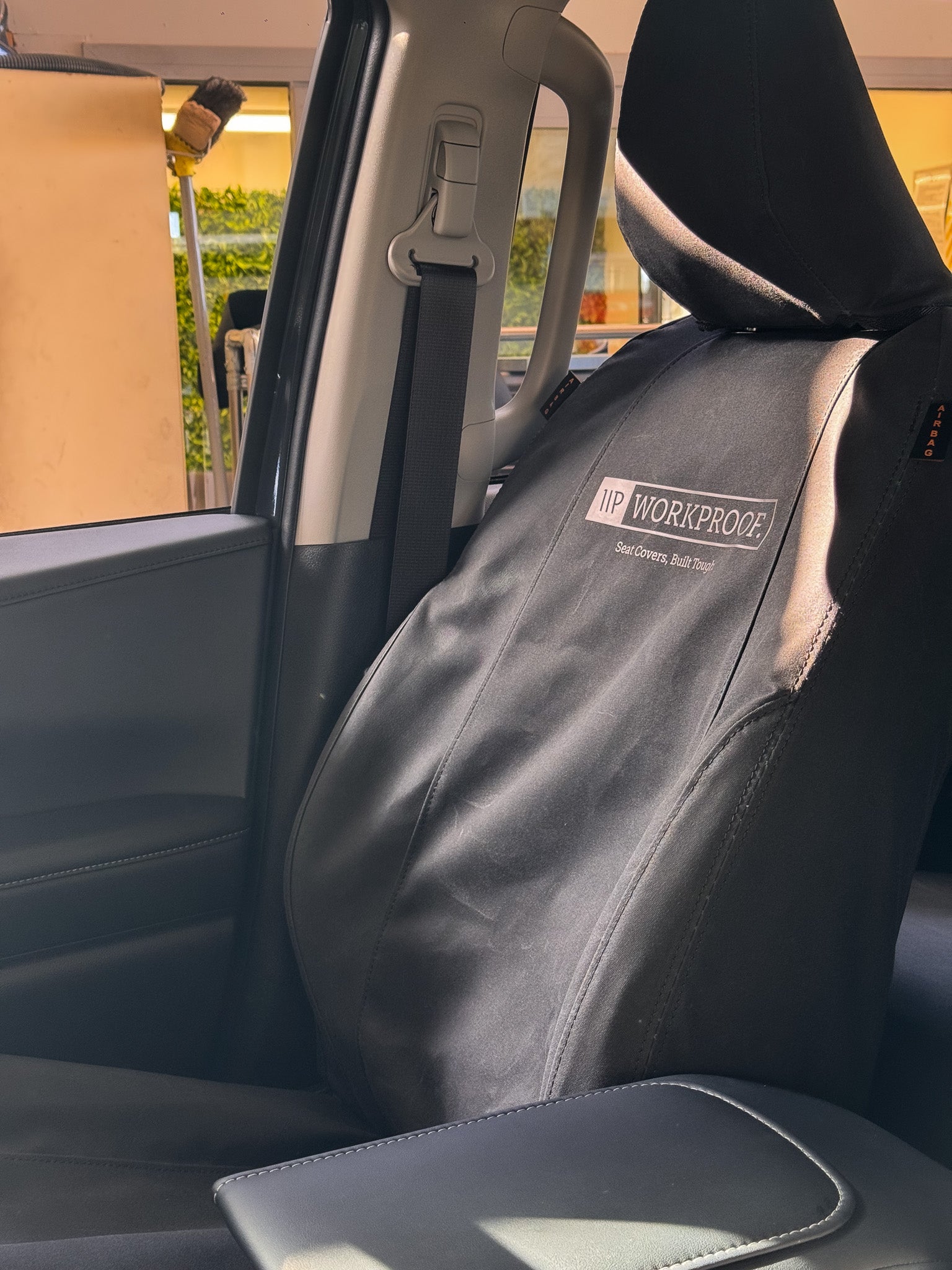 WORKPROOF 12oz black canvas seat covers for Toyota Hilux Next Gen SR SR5 — waterproof and rot-proof
