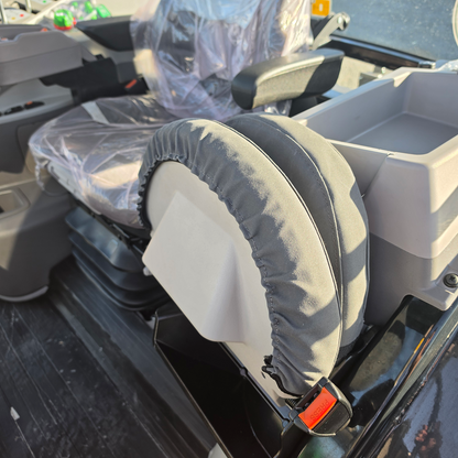 WORKPROOF heavy-duty canvas seat cover on folded Deutz Dickie tractor seat, showing durable construction and secure fit for hard-working agricultural use