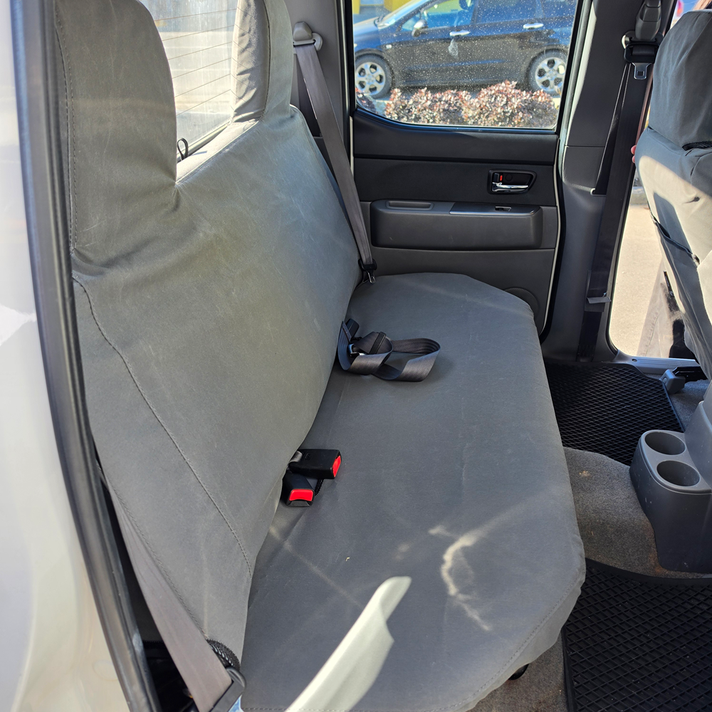 Ford Ranger 2006–2010 rear seat fitted with charcoal canvas seat covers
