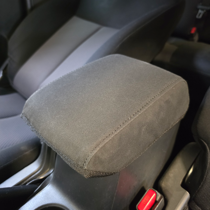 Mitsubishi Triton 2014–2024 centre console fitted with a custom-made Workproof black canvas cover for durable protection against everyday wear and tear.