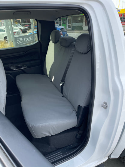 Rear bench seat view of WORKPROOF heavy-duty canvas seat covers fitted to Ford Ranger with waterproof protection and durable factory-style fit.